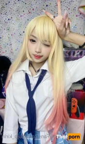 6560112
